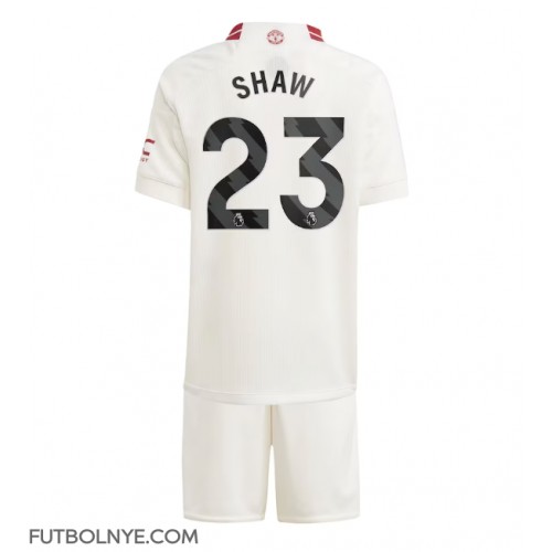 Camiseta Manchester United Luke Shaw #23 Tercera Equipación para niños 2023-24 manga corta (+ pantalones cortos)